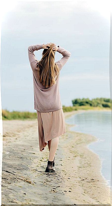 Woman walking on the beach